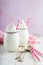 Vanilla milkshake with whipped cream and sprinkles