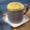 vanilla mugcake is microwaved. Homemade cupcake in a coffee mug.