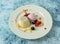 vanilla panna cotta with strawberry and blackberry served in plate isolated on background top view of italian food