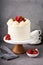 Vanilla raspberry cake with white frosting