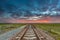 Vanishing railroad in open rural countryside