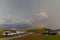 Vanlife in mountain landscape near Castelluccio village in National Park Monte Sibillini, Umbria region, Italy