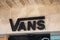 vans logo brand and text sign on wall facade storefront fashion business