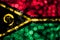 Vanuatu abstract blurry bokeh flag. Christmas, New Year and National day concept flag