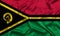 Vanuatu national flag background with fabric texture. Flag of Vanuatu waving in the wind. 3D illustration