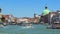 Vaporetto and motorboats moving down Grand Canal in Venice, transportation