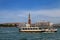 Vaporetto water bus going in front of Piazza San Marco in Venice, Italy