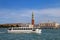 Vaporetto water bus going in front of Piazza San Marco in Venice, Italy