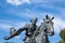 vaquero driving longhorn cattle on the Chisholm Trail