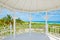 Varadero beach in Cuba seen from the windows of a white seaside wooden pavilion