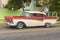 VARADERO, CUBA - JANUARY 05, 2018: Classic red Ford retro car ri