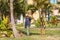 VARADERO, MATANZAS, CUBA - MAY 18, 2017: Cuban gardener on the background of the garden. Copy space for text.