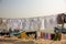 Varanasi, India, 15 november, 2019/ Life on the Ganges: colorful clothes drying at the sun on the steps leading to the river.