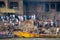 Varanasi, India, 16 november, 2019 / Hinduist cremation pyre in Manikarnika Ghat in front of the Ganges river in Varanasi,  India