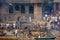 Varanasi, India, 16 november, 2019 / Hinduist cremation pyre in Manikarnika Ghat in front of the Ganges river in Varanasi,  India