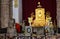 Varanasi, India: Golden statue of sitting Buddha in meditation at the Buddhist temple Mulagandhakuti vihara,