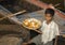 Varanasi, India, Indian Boy selling Aarti