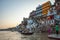 Varanasi, India - October 10, 2010: View from boat on the Ganges with people bathing on the ghats