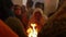 Varanasi, India. People making offerings into a consecrated fire