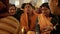 Varanasi, India. People making offerings into a consecrated fire