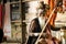 Varanasi, India: Portrait of a hindu white bearded sadhu, pilgrim or Aghori baba with a lota, braided necklace