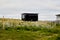 Vardo, Norway - 23 June 2019: Black kube building which is memorial devoted to memory innocently killed during witch hunting.