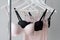 Vareity of bra hanging on a hanger. Textile, Underwear. Female bra in lingerie underwear store. Advertise, sale, fashion