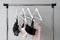 Vareity of bra hanging on a hanger. Textile, Underwear. Female bra in lingerie underwear store. Advertise, sale, fashion