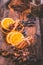 Variation of  Christmas spices, dried orange, cocoa and tonka beans on wooden table for baking