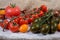 Varicolored cherry tomatoes, single ordinary tomato Close-up