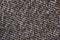 Varicolored tweed like texture, varicolored wool pattern, textured melange upholstery fabric background copy space.