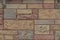 Varied sized and color brick background texture