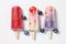 Variety of berry flavors of popsicles overhead view on white background, generative AI