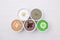 Variety of body scrubs on cotton background.