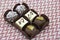 Variety of bonbons, chocolate and coconut, white chocalate and chocolate with chestnut.