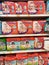 Variety brand of baby and child diapers displayed on the rack for sale in large supermarkets.