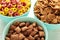 Variety of cereals in blue bowls, quick breakfast background