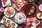 Variety of Christmas holiday desserts and sweets. Above view table scene over a wood background.