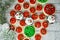 Variety of Christmas holiday treats with chocolate cupcakes and buttercream iced sugar cookies - top view flatlay on wood