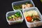 Variety of clean dieting dishes in containers. Healthy clean food concept.