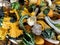 A variety of colored decorative mini pumpkins at the market place