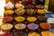 Variety of colorful Arabic spices and herbs on the Arab street market stall. Dubai Grand Spice Souk old souq