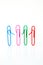 Variety of colorful paper clips, family talk together concept