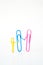 Variety of colorful paper clips, family talk together concept