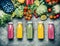 Variety of colorful Smoothies or juices bottles beverages drinks with various fresh ingredients: fruits ,berries and vegetables