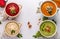 Variety of colorful vegetables cream soup: with broccoli, beets, white beans and pumpkins, healthy eating concept, Copy space,