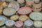 Variety of Colorfully Painted Ceramic Pots in an Outdoor Shopping Market. pottery in the shop window