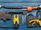 Variety of construction tools on blue wooden background. Top view with Generative AI