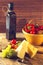 Variety of different vegetables,with glass bottle and cheese