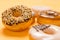 A variety of flavoured doughnuts on yellow background close up